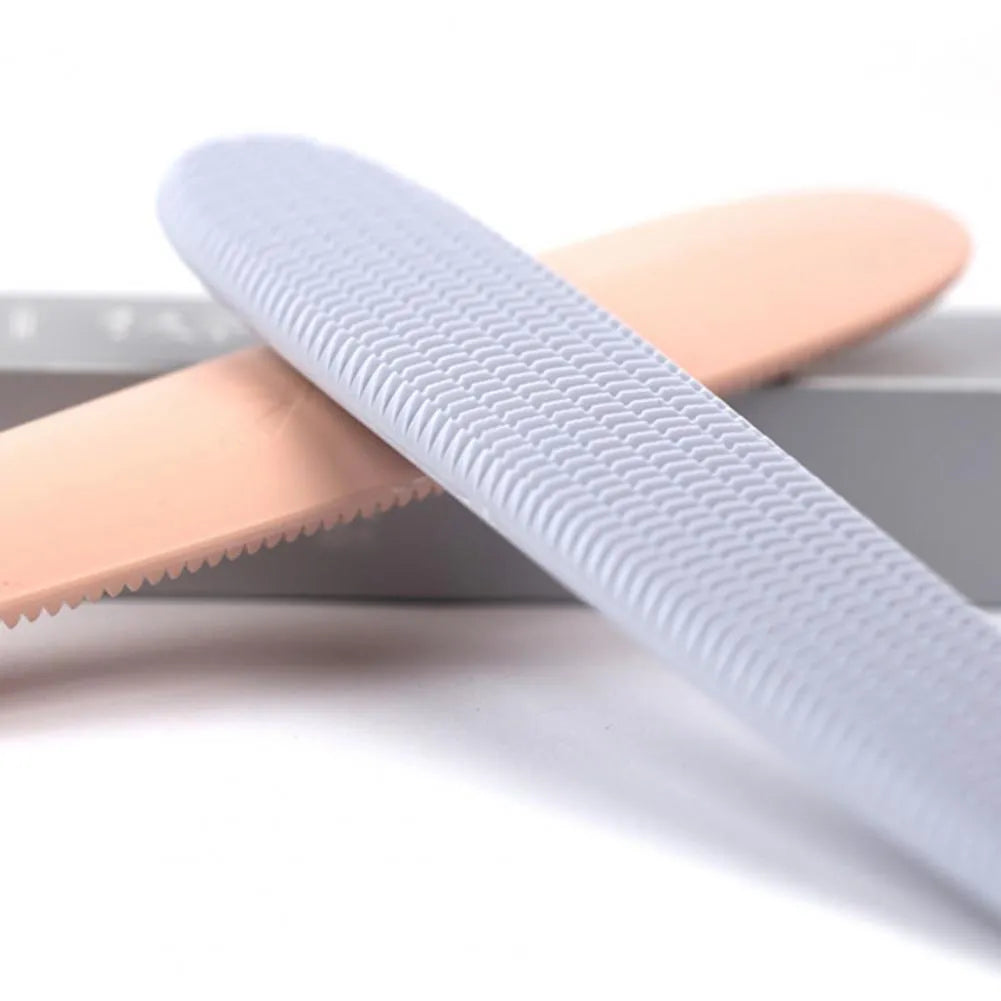 Gray cat comb with tongue massage design and narrow and wide ends, 21cm length, on a white background