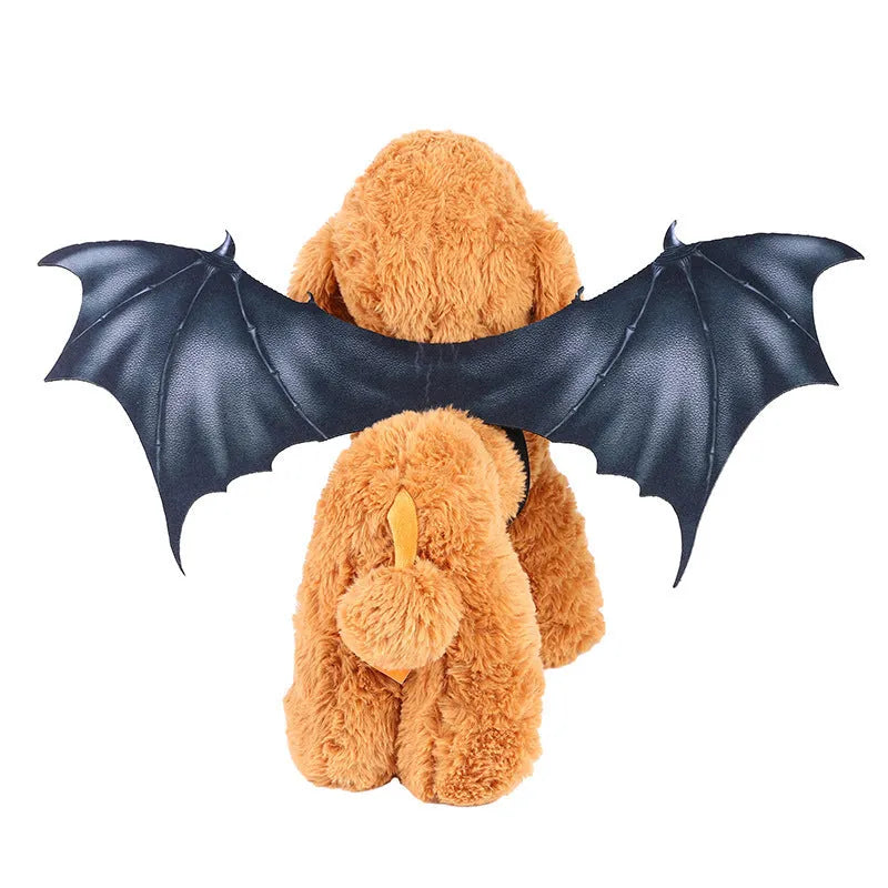 Black cloth bat wing costume for dogs and cats on a pet, showing three available sizes.