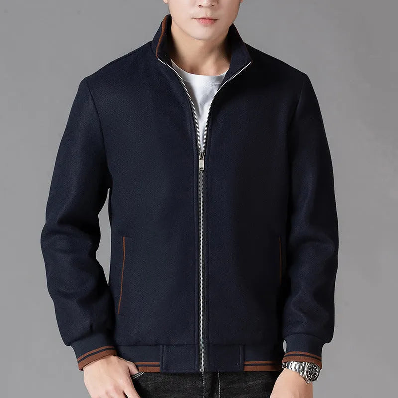 Men's grey wool fleece autumn jacket with long sleeves and a stick pocket, laid flat.