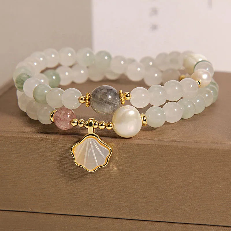 Women's crystal bracelet with Tianshan jade ginkgo leaf pendant and gold-plated setting