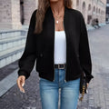 Black women's zip jacket with long sleeves and faux pockets