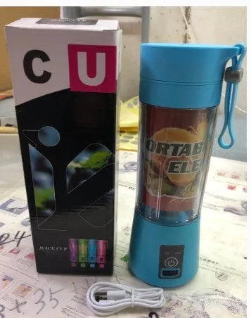 Mini USB electric citrus juicer in pink with stainless steel 304 blade and portage rope
