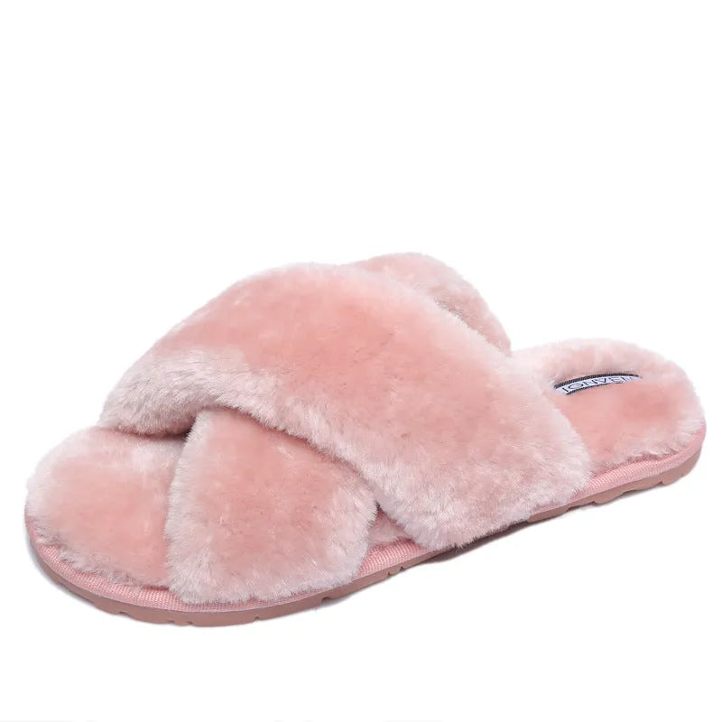 Women's black cross open-toe fur slippers with a textured non-slip rubber sole.