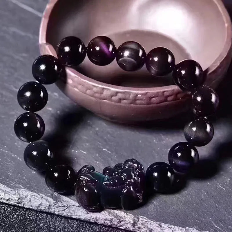 Natural ice colour eye obsidian crystal bracelet showing bead texture and sizing options