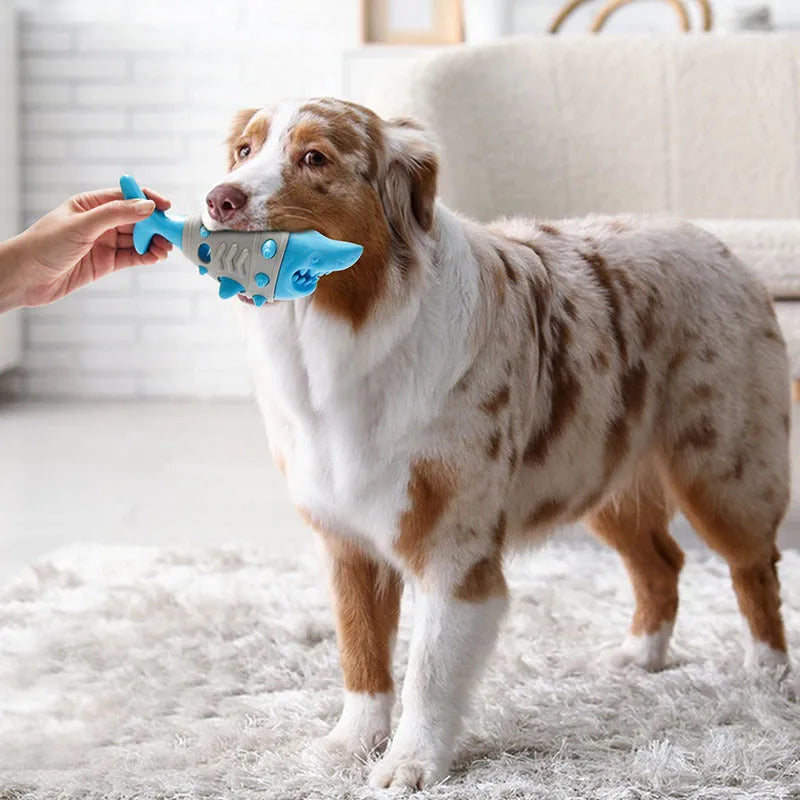 Dog teething leaky toy in blue with shark-tooth texture and vent holes