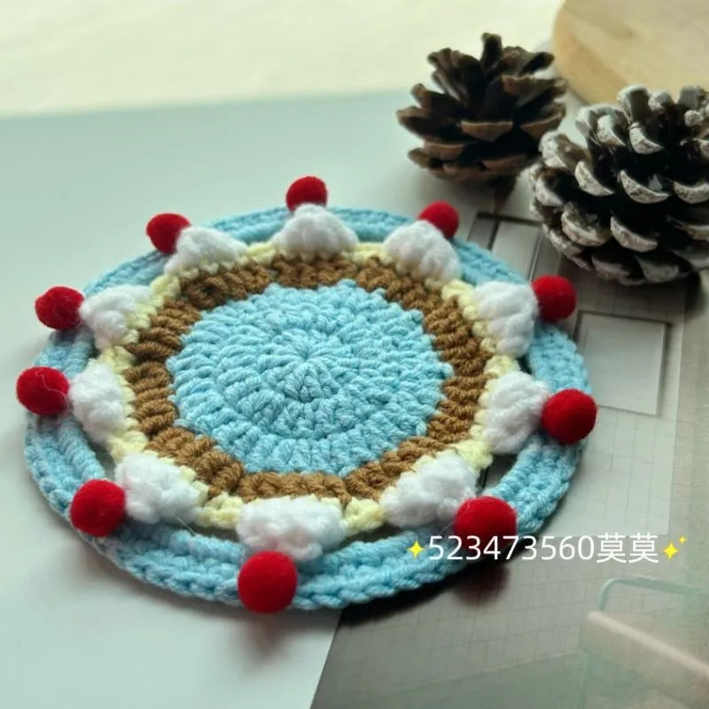 Round wool cake coaster 9cm diameter on a wooden table