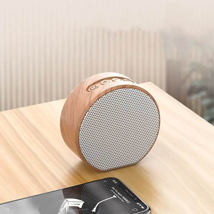 Wood grain Bluetooth speaker in white colour with built-in battery and USB interface