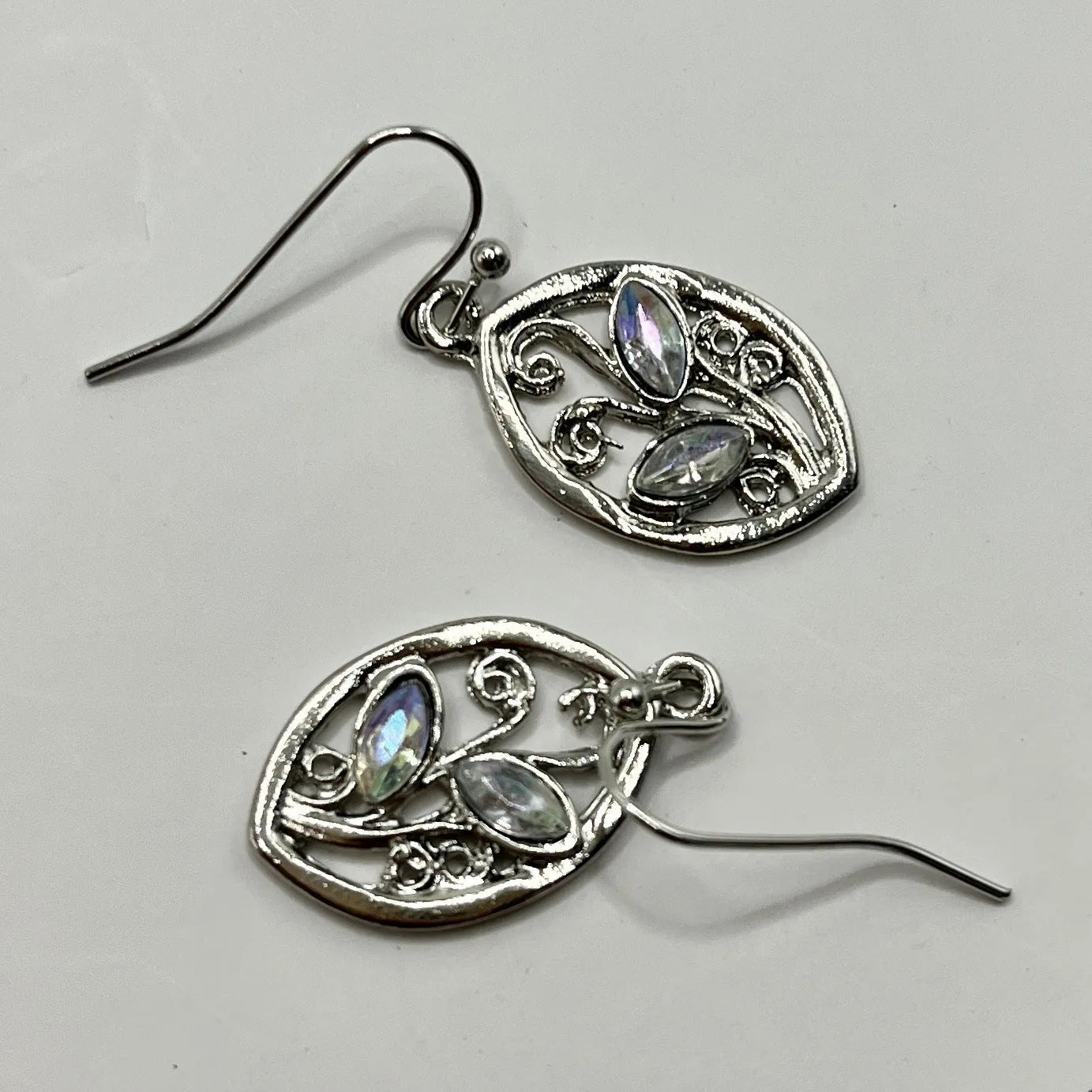 Silver colour leaf-shaped earrings with embedded colourful moonstones for women