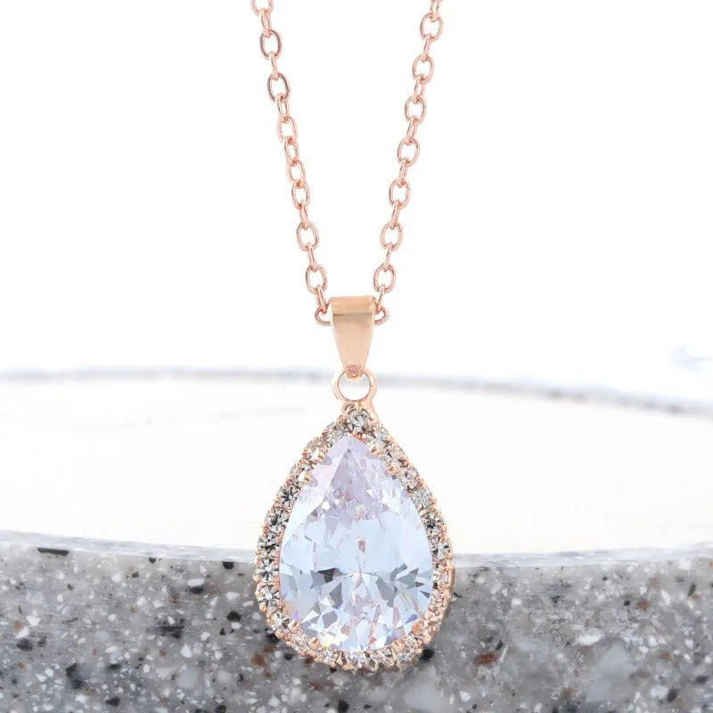 Drop-shape alloy necklace with rhinestone inlay available in eight electroplated colour finishes