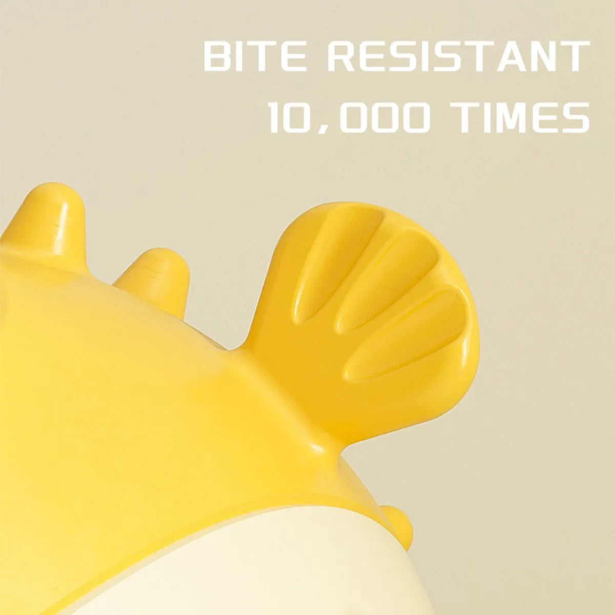 Yellow fish-shaped vinyl dog chew toy with textured surface and squeaker.