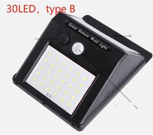 Solar outdoor garden lamp with motion sensor and LED bulbs for automatic night lighting