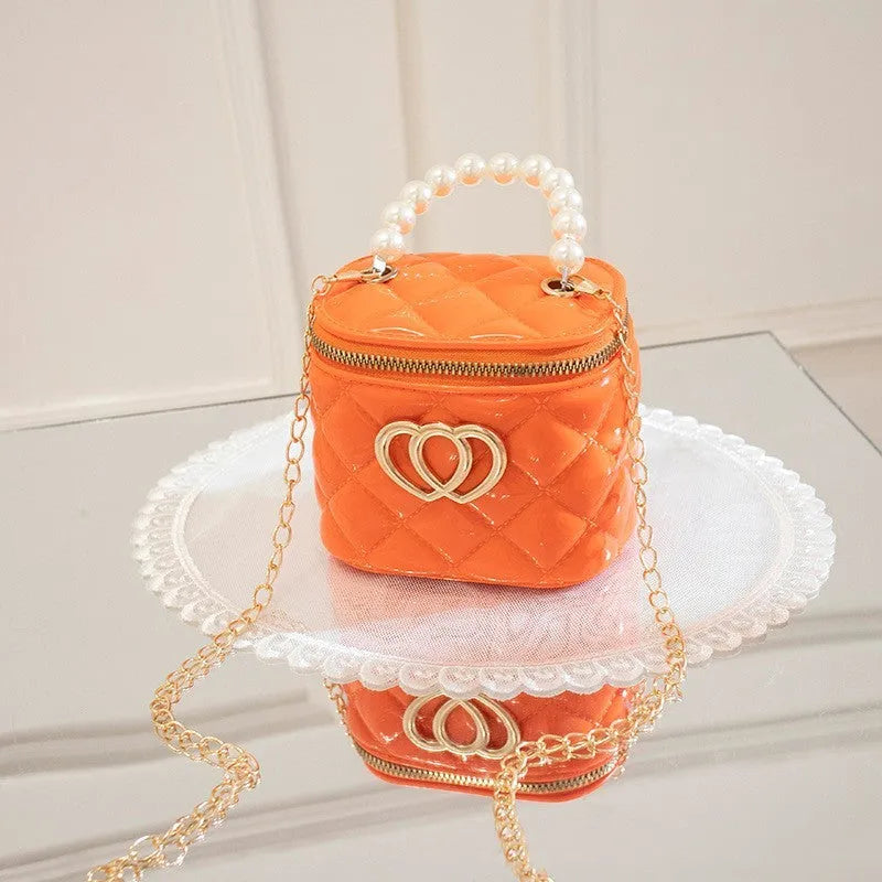 PVC bucket gel bag for women with heart pattern in choice of seven colours.