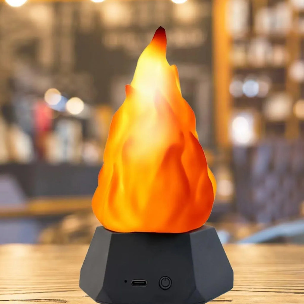 Flame shaped outdoor decorative light with vinyl shell and gold charging base