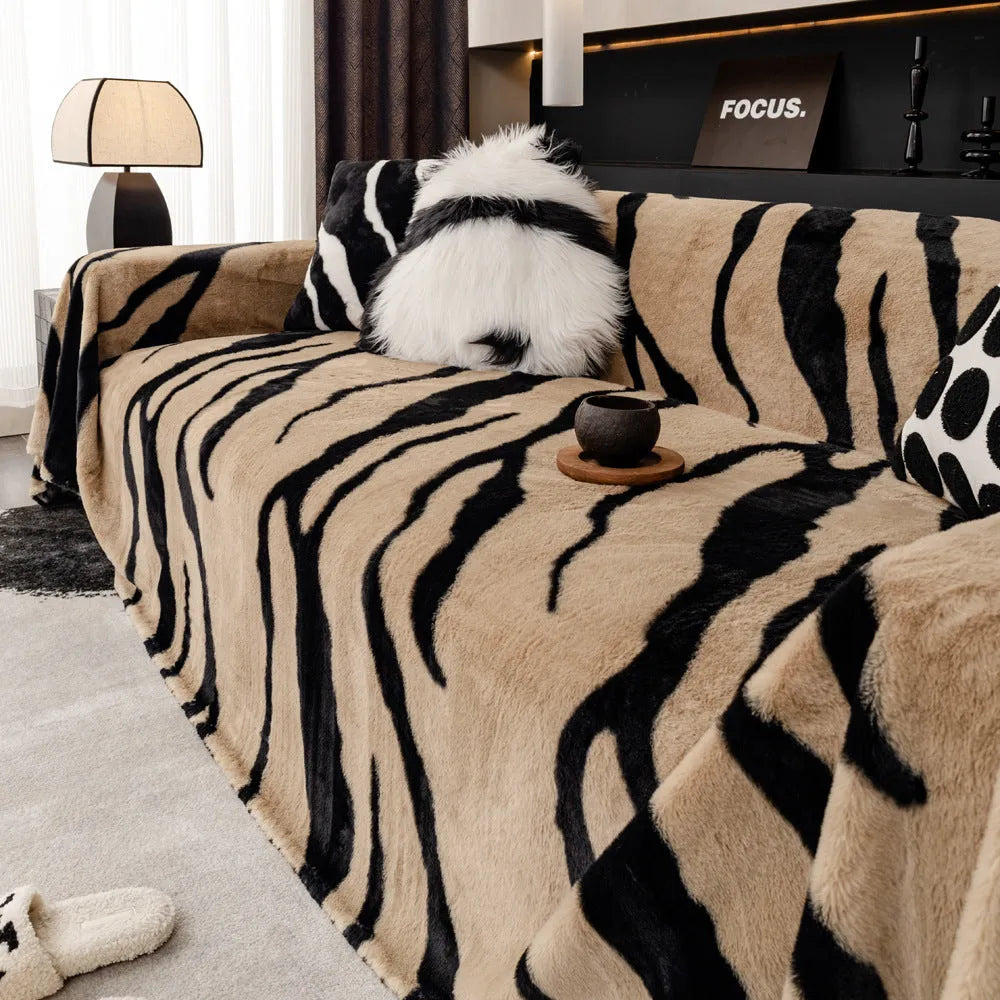 Zebra pattern flannel sofa cover in light luxury style draped over a sofa