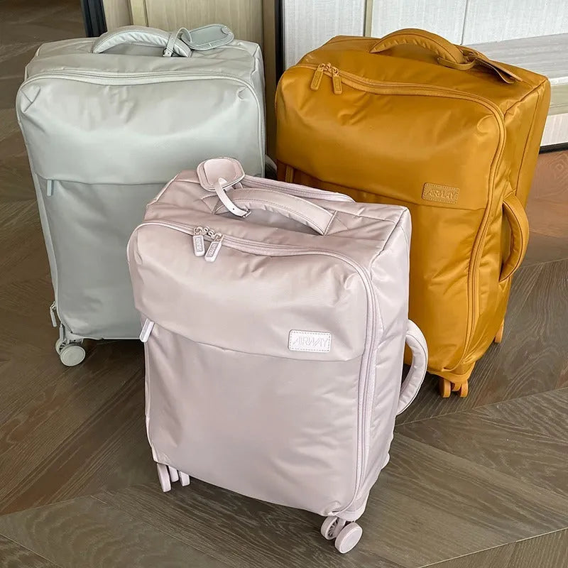 Ultra-light waterproof Oxford cloth suitcase with universal wheels in bluestone green colour