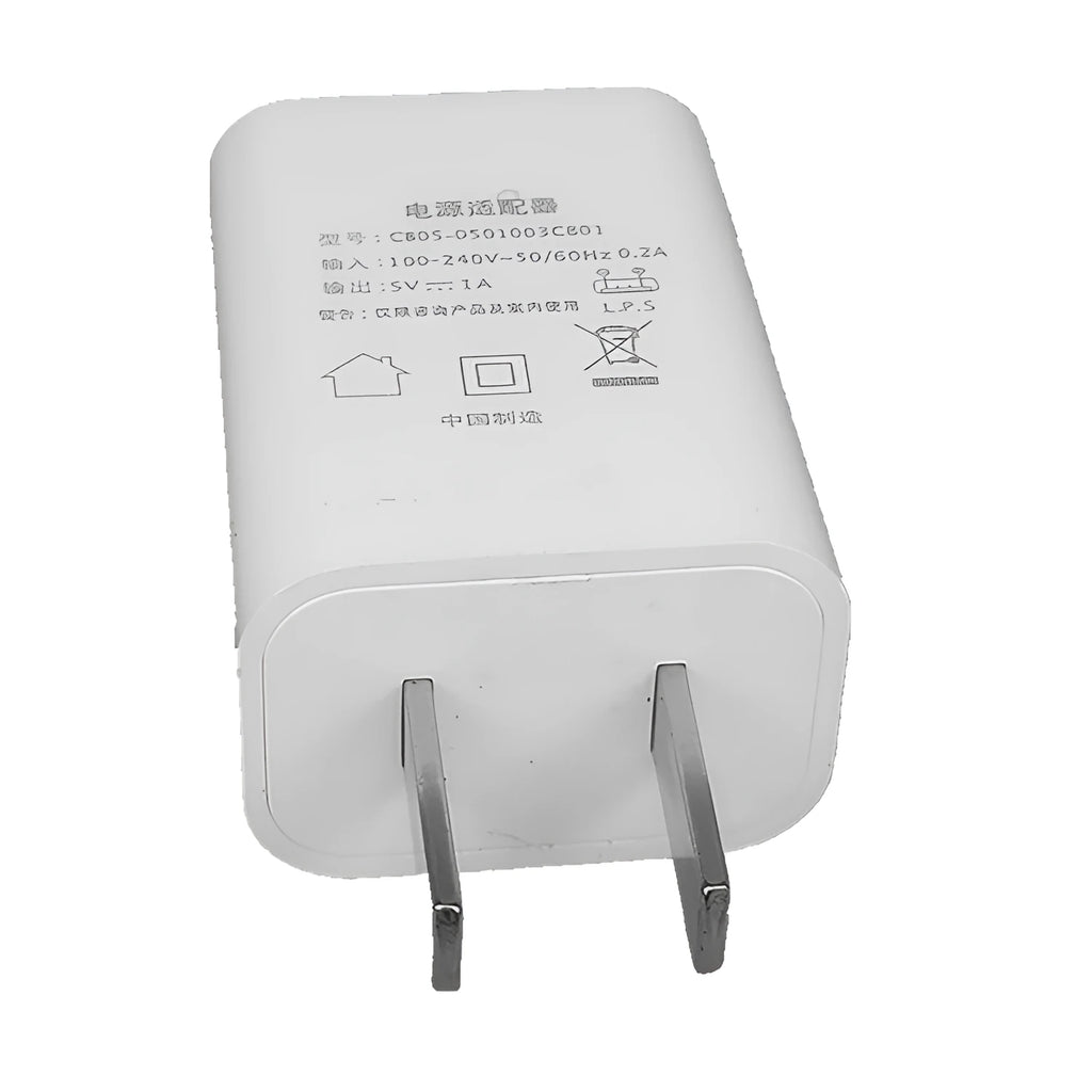White 5V 1A USB wall charger with UK plug and CE FCC marks.