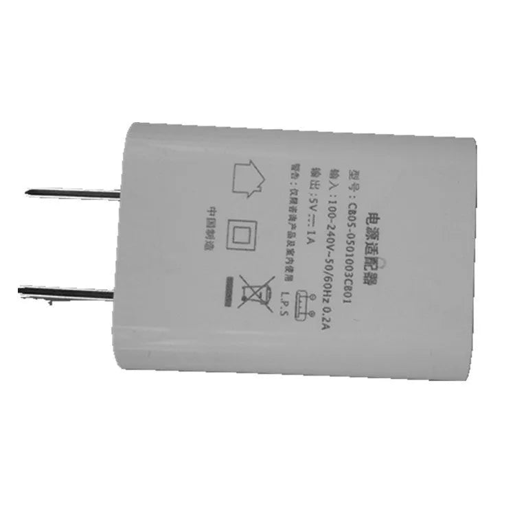 White 5V 1A USB wall charger with UK plug and CE FCC marks.