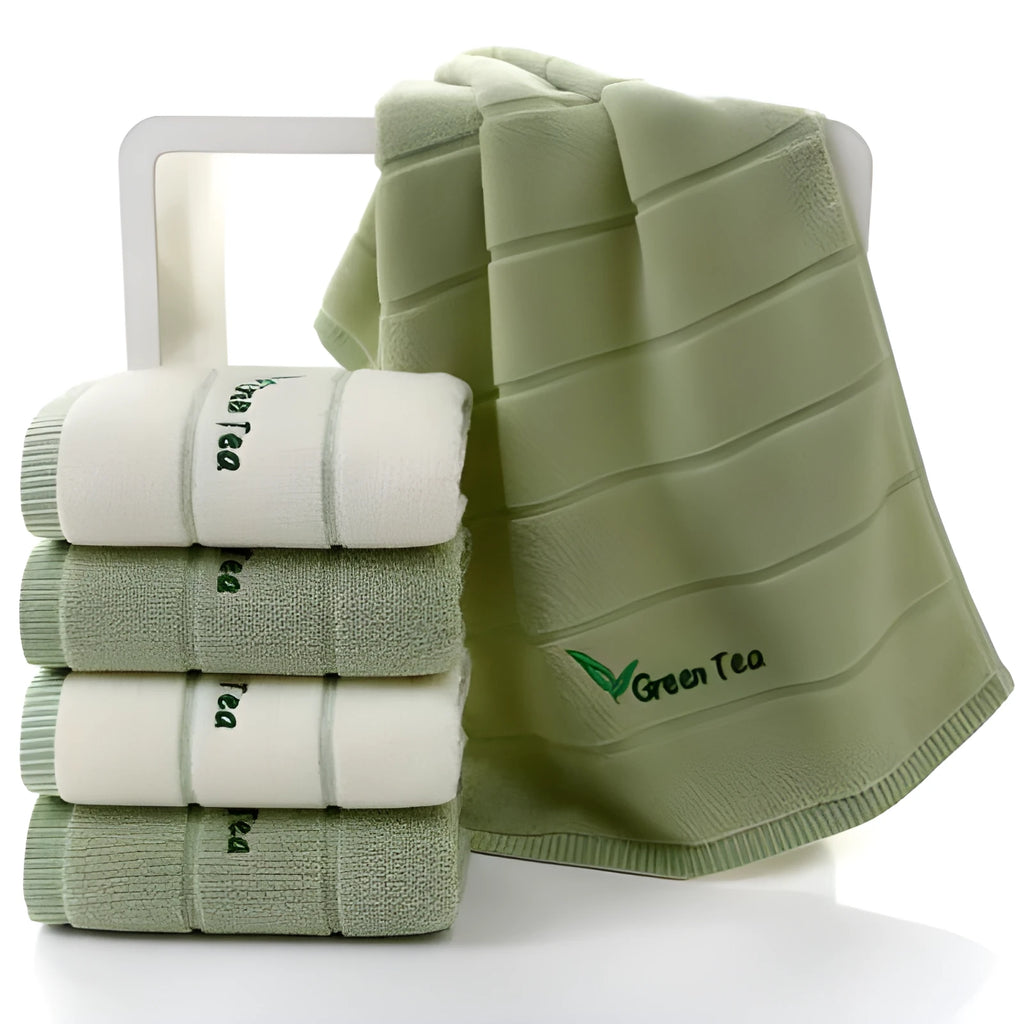 Pure cotton 32 strand embroidered face washing towel 34x74cm in green on a white background