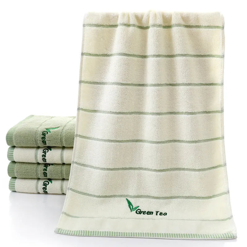 Pure cotton 32 strand embroidered face washing towel 34x74cm in green on a white background