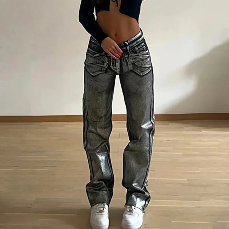 Blue high waisted straight leg jeans with silver contrast details on denim fabric