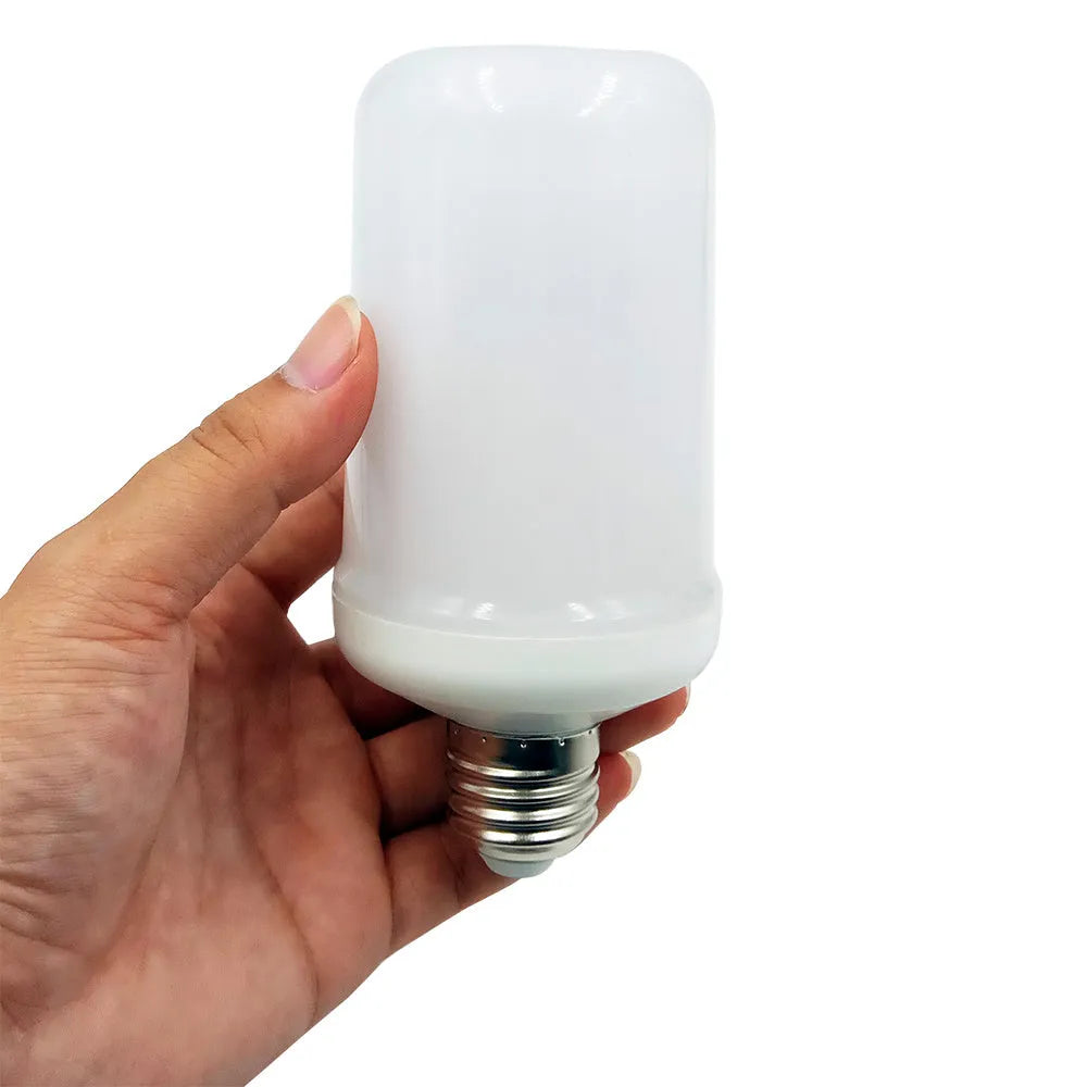 Atmosphere decorative flame effect LED lamp with flickering orange light on a dark background.