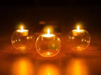 Clear round hollow glass candle votive holder in hand-blown glass