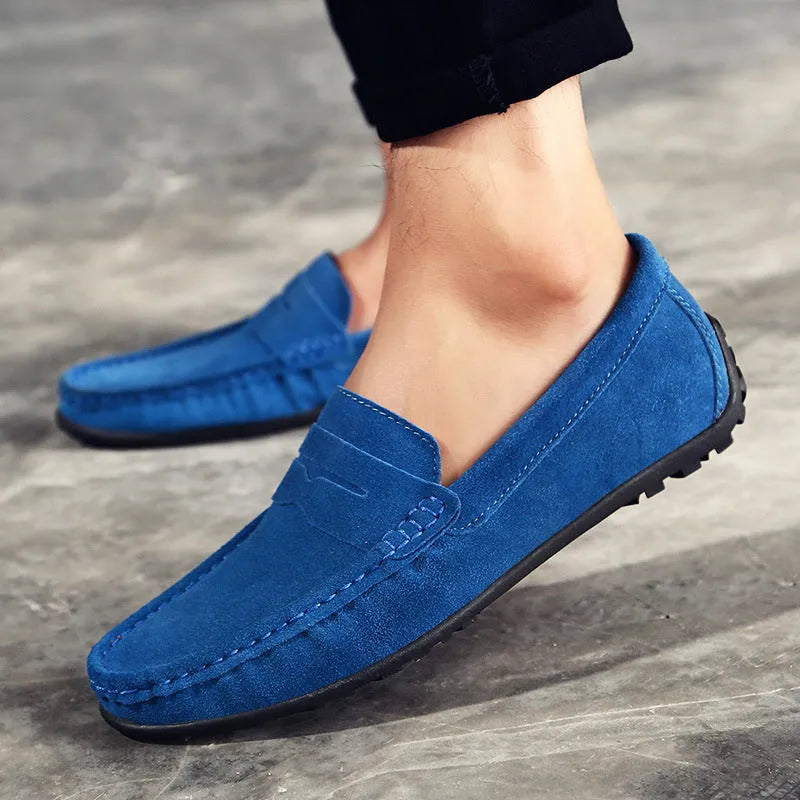 Men's suede Gommino loafers in brown with a round toe and flat rubber sole