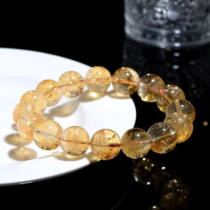 Natural yellow citrine bracelet with geometric beads in various size options from 4mm to 20.8mm diameters