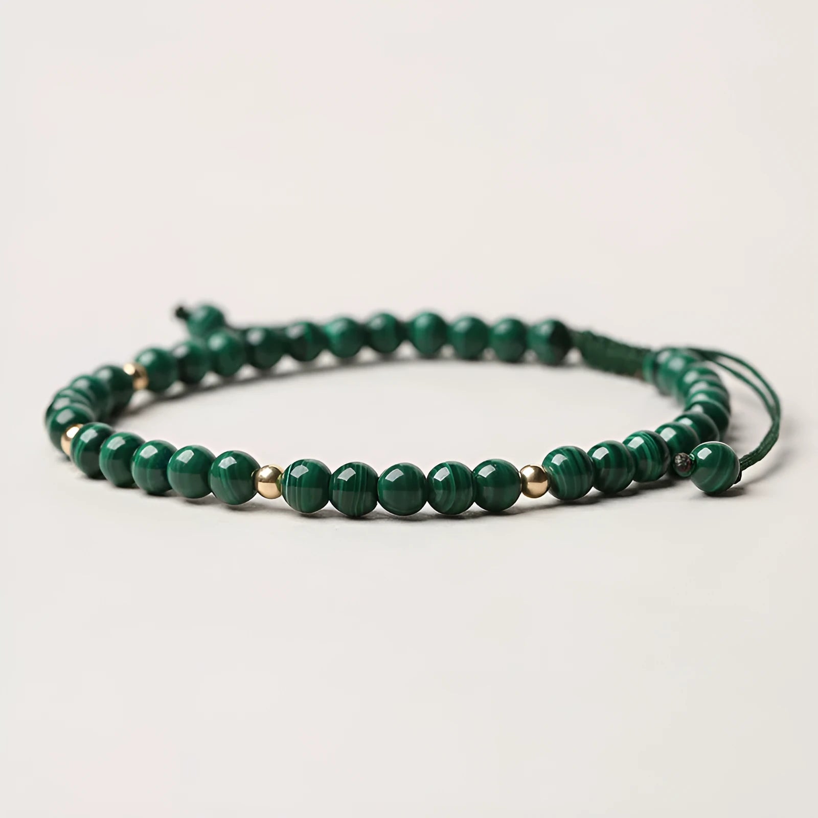 Natural malachite crystal bracelet for women with hand woven golden balls and textured stone beads