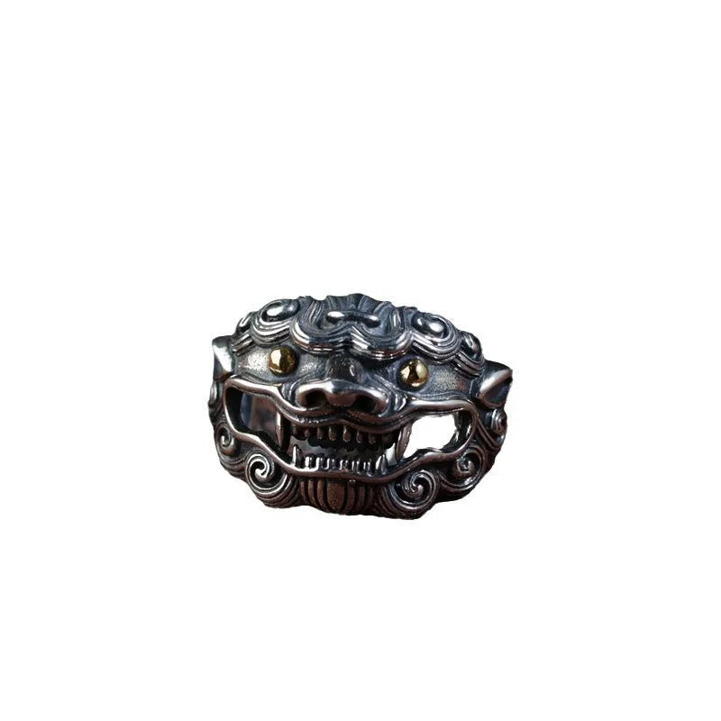 Silver open-style ring with detailed domineering jibeast animal pattern and diamond accents