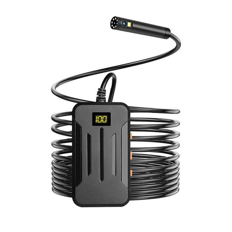 F300 WiFi dual lens endoscope inspection camera with magnet and hook accessories on a table