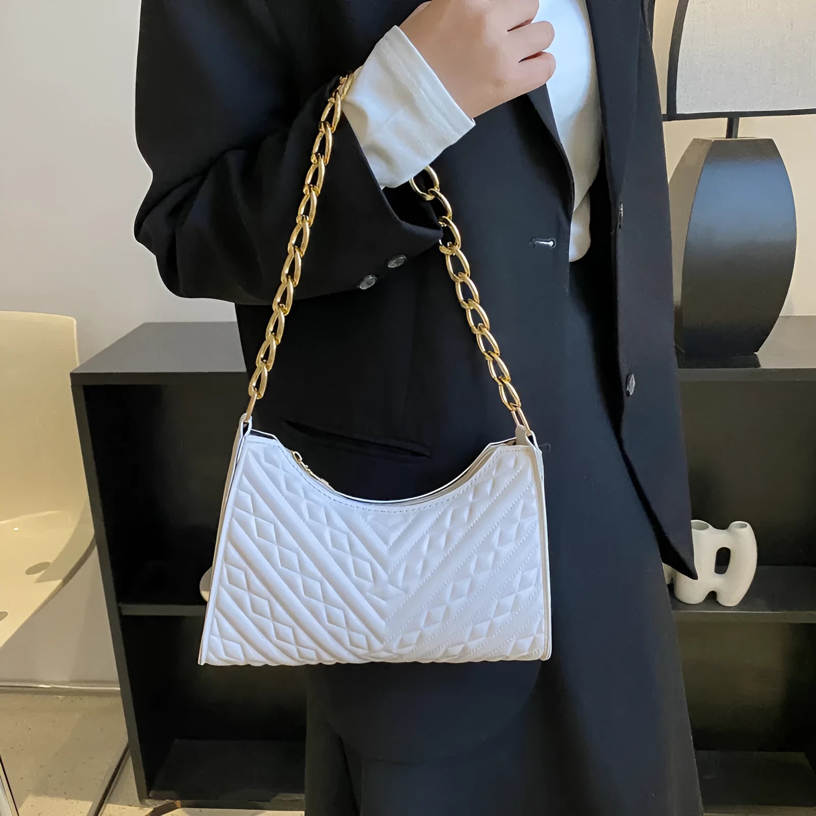 Brown PU leather pleated chain baguette shoulder bag with single strap showing vertical square shape