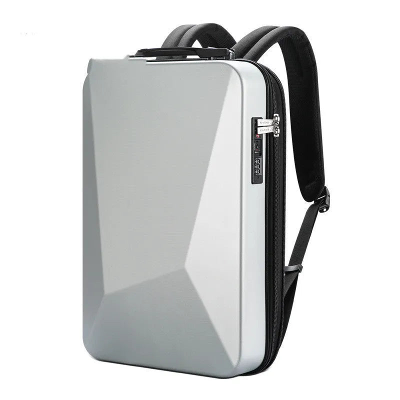 Large grey hard-shell gaming backpack with dual straps, showing lock and internal organiser pockets for computer and phone.