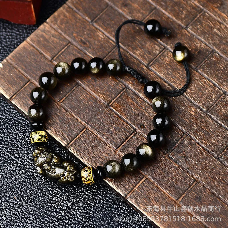 Natural obsidian Pi Xiu bracelet with hand-woven cord and golden sheen on black beads