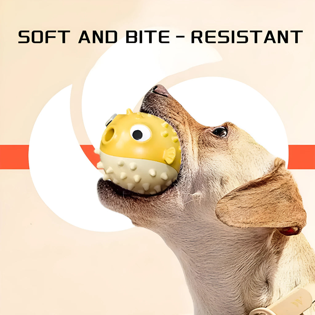 Yellow fish-shaped vinyl dog chew toy with textured surface and squeaker.