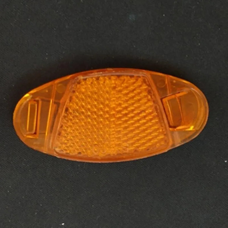 Yellow and white plastic bicycle spoke reflectors measuring 7.2cm for night safety