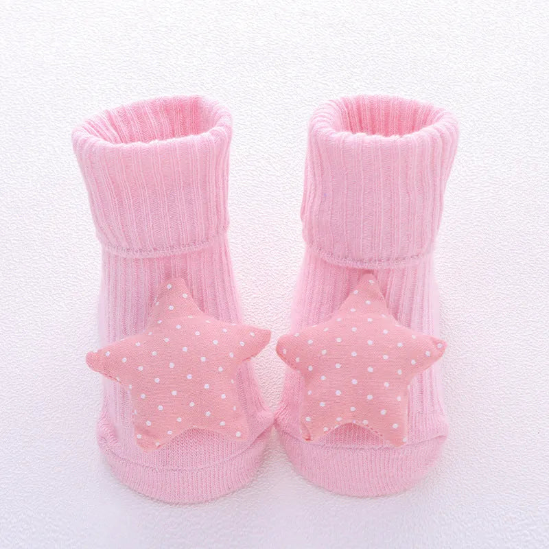 Cotton baby floor socks in multiple patterns including blue bow and lion designs