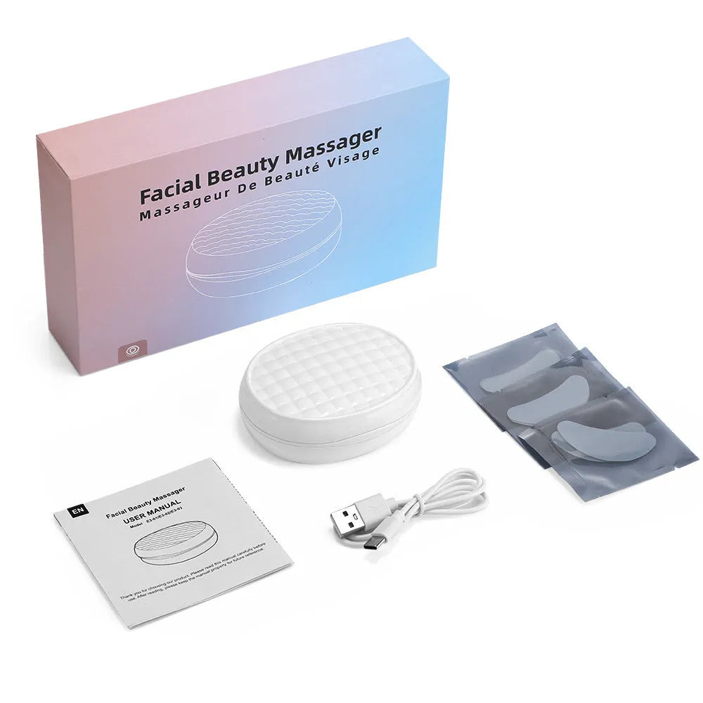 White wireless red light EMS eye and facial massager device for home beauty treatments