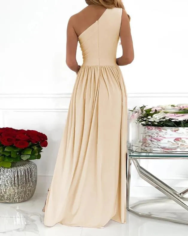 Women's apricot one shoulder maxi dress with high split and cutout detail on mannequin