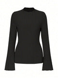 Long sleeve round neck top with lantern sleeves in black colour, loose fit casual styling