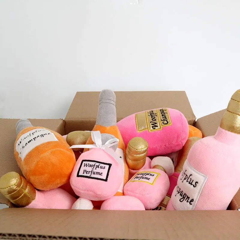 Plush wine bottle dog toy with squeaker in assorted colours