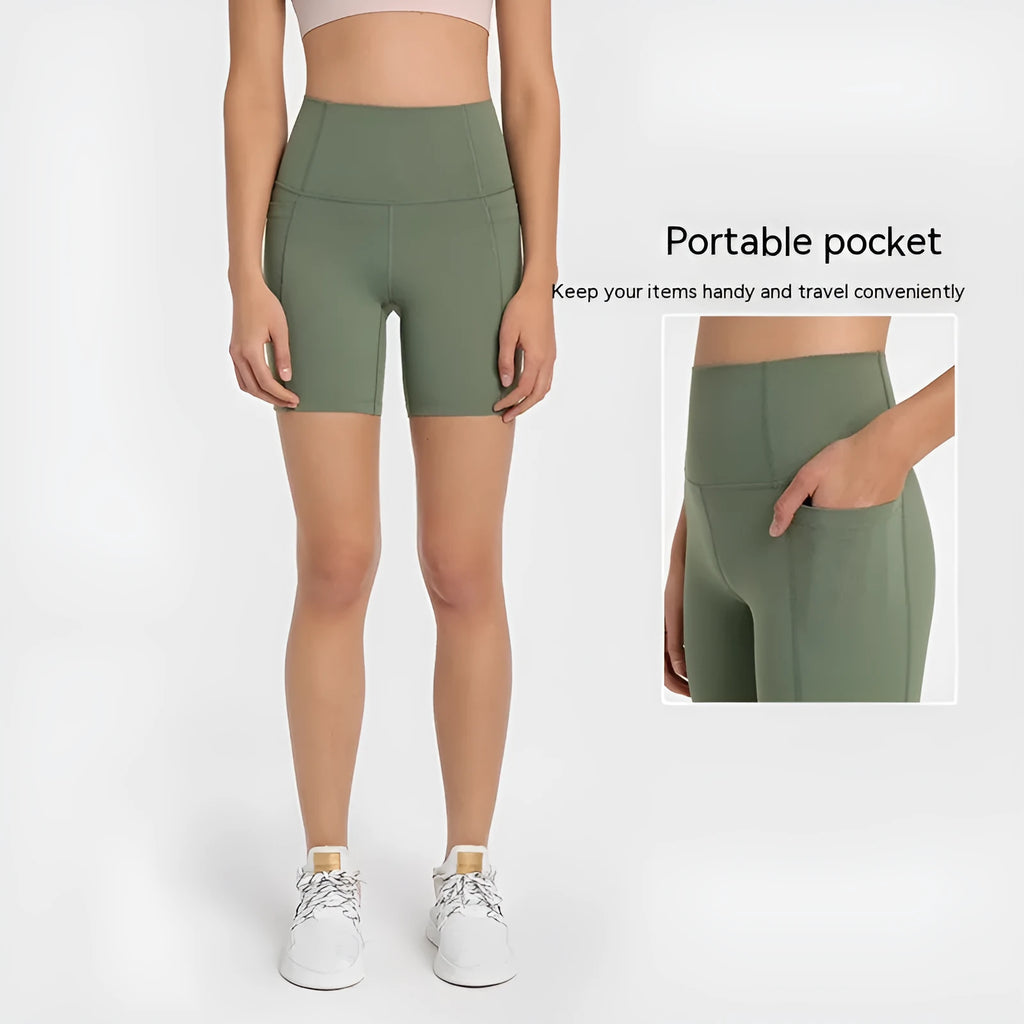 Women's mid-length sports shorts in black, super stretch fabric for running and gym