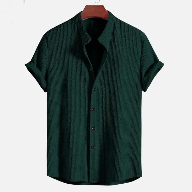 Men's loose short sleeve summer shirt in polyester available in multiple colours.