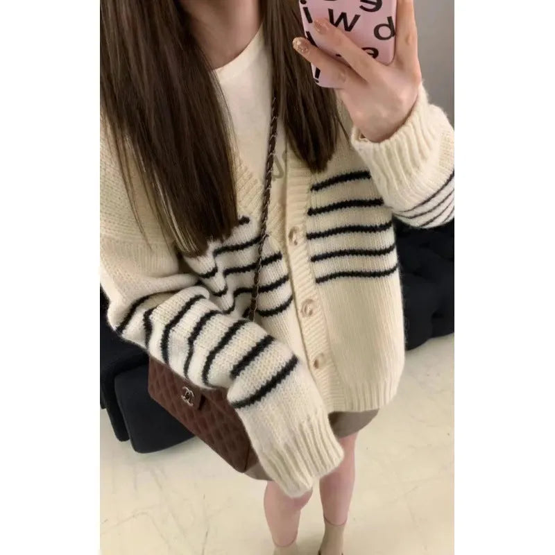 Women's grey collar button cardigan with 3D pattern, shown open and buttoned.