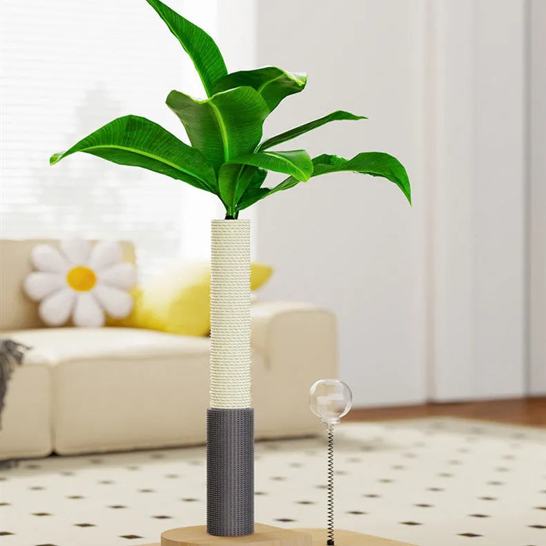 Wooden cat scratching post in Canna colour with a chamfered column and a hanging toy ball.