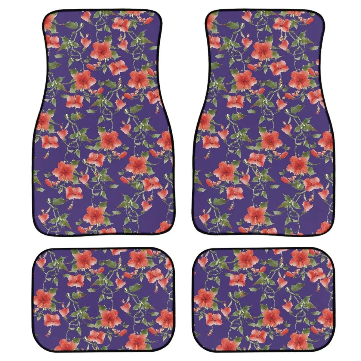 Black four-piece rubber car floor mat set with textured surface, shown fitted in a vehicle footwell.