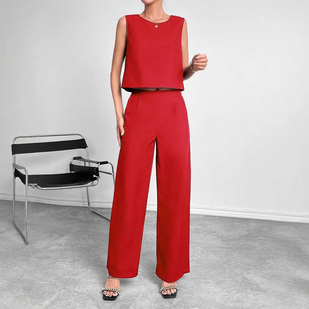 Red sleeveless top and wide-leg trousers two-piece set on a hanger.