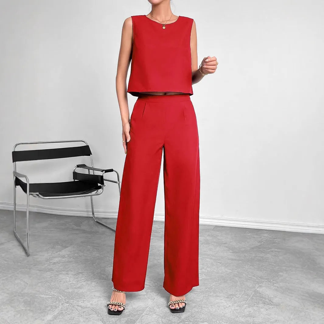 Red sleeveless top and wide-leg trousers two-piece set on a hanger.