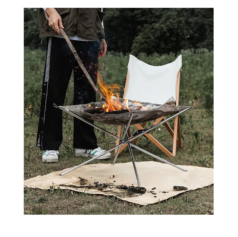 Silver stainless steel large barbecue grill net for outdoor cooking.