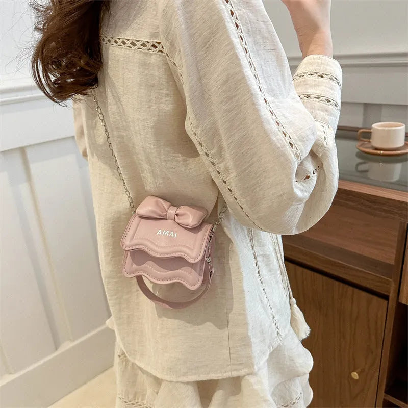 Women's mini crossbody bag in PU leather, available in several colour options with single strap